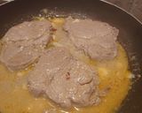A picture of step 6 of Garlic Butter Pork Steaks.