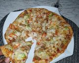 A picture of step 7 of Chicken pizza.