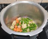 A picture of step 4 of GREEN MOONG DAL KHICHDI with VEGGIES...