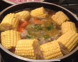 A picture of step 7 of Pork rib soup with pickled mustard greens.