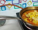 A picture of step 4 of Bedmi Puri with Aloo Sabzi.