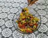 A picture of step 5 of Mexican nachos salad.