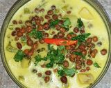 A picture of step 3 of Brown chana (Bangal gram) and Potato in coconut milk.