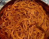 A picture of step 6 of Spaghetti with Tomato, Pesto, and Onion.