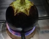 A picture of step 1 of Baingan ka bhurta.
