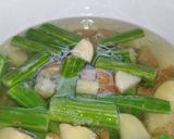 A picture of step 2 of Drumstick potato fry.
