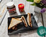 A picture of step 6 of 5 minute Peanut Butter & Nutella Sandwich.