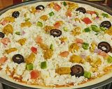 A picture of step 2 of Chicken Tikka Pizza 🍕🍕.