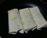 Foto del paso 13 de la receta Burritos de secreto ibérico, cebolla caramelizada y mozzarela 🌯