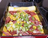 A picture of step 6 of Corn and Sausage Tamagoyaki.