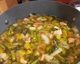 A picture of step 9 of Sinigang (sour soup).