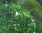 A picture of step 1 of Oats tikki with leafy vegetables.