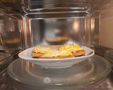 A picture of step 4 of Toasts pizza.