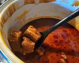 A picture of step 9 of Birria Caldosa.