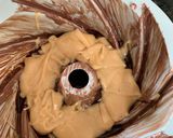 A picture of step 4 of Peanut Butter Chocolate Cake with Peanut Butter Sauce.