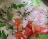 A picture of step 3 of Turaii (Ridge gourd) with kalonji and curry leaf.