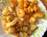 A picture of step 1 of Chingri Pui Metuli (Malabar Spinach Seeds Curry with Prawns).