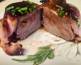 A picture of step 9 of Brad's bacon wrapped venison loin chops with port wine au jus and cucumber salad.