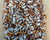 A picture of step 5 of Pumpkin Spice Chocolate Coated Pretzels.