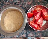 A picture of step 1 of Radish leaves sabzi, tomato arhar dal,rice & roti.
