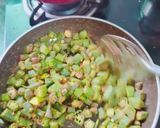 A picture of step 4 of Basen bhindi fry.