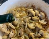 A picture of step 6 of Pork Medallions in a Mushroom and Sherry creamy sauce.
