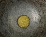 A picture of step 1 of Coconut Ladoo.