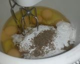 A picture of step 2 of Doughnuts #coastal coconut dish contest.