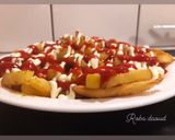 صورة لخطوة 3 من وصفة تتبيلة بهارات رائعة للبطاطا المقلية 😋😋