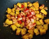 A picture of step 2 of Kaddu ki sabzi (pumpkin sabzi).