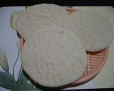 A picture of step 4 of Spinach Alfredo pizza (homemade base).