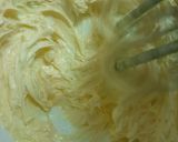 A picture of step 4 of Vanilla cup cake with butter cream frosting 😊.