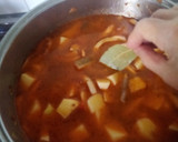 Foto del paso 6 de la receta: Patatas guisadas con calamar congelado