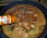 Foto del paso 10 de la receta Arroz caldoso de pollo y conejo