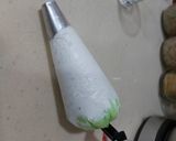 A picture of step 12 of Kiwi swiss roll cake.