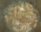 Foto del paso 2 de la receta: Estofado de alcachofas, almejas y langostinos
