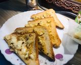 A picture of step 5 of Cheesy Garlic bread.