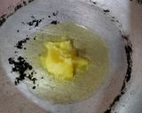 A picture of step 1 of Coconut ladoo.