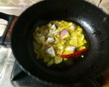 A picture of step 3 of Aloo bathe aloo choka and aloo pithika.