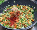 A picture of step 4 of Stuffed peppers with a twist! No meat.