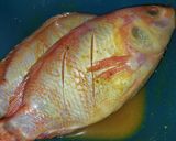 Foto langkah ke 1 dari resep Pecak Ikan Nila Ala Betawi.