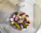 Foto langkah ke 3 dari resep Sayur Daun Singkong Bumbu Kuning.