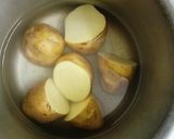 A picture of step 1 of Suki bhaji (potato sabji).