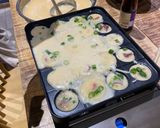 A picture of step 5 of Takoyaki using plain flour / octopus balls 🐙.