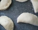 A picture of step 9 of Sardine Empanadas with Tomato and Onion Sauce.