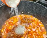 A picture of step 8 of Jambalaya.