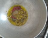 A picture of step 3 of Turmeric pickle.