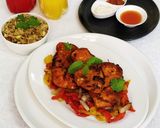A picture of step 4 of Pan Fried Chicken Breast on a bed of Pepper's and Onion.