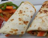 A picture of step 9 of Tortilla Egg Roll.