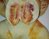 Foto del paso 3 de la receta: Cruasán de masa de pizza rellenos jamón york queso y bacon